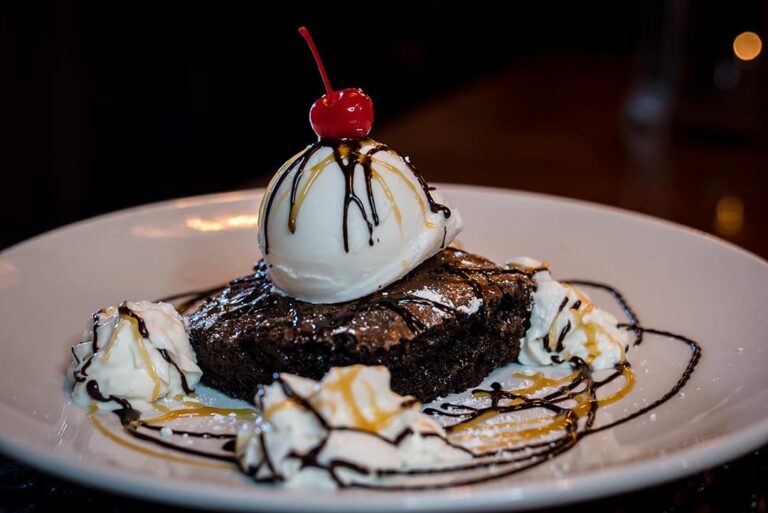Fudge brownie with whipped cream
